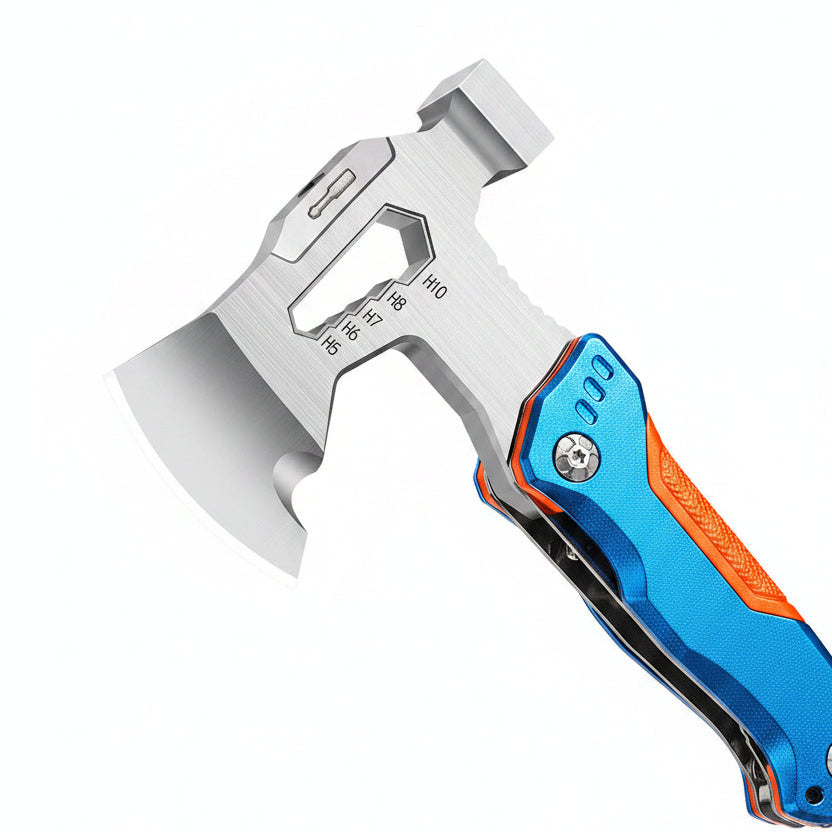 A close-up product shot of a folding knife shown against a black background with Chinese text overlays highlighting features of the axe head and inner hex key. The knife has a silver metallic blade, a blue and orange handle, and a black textured grip.