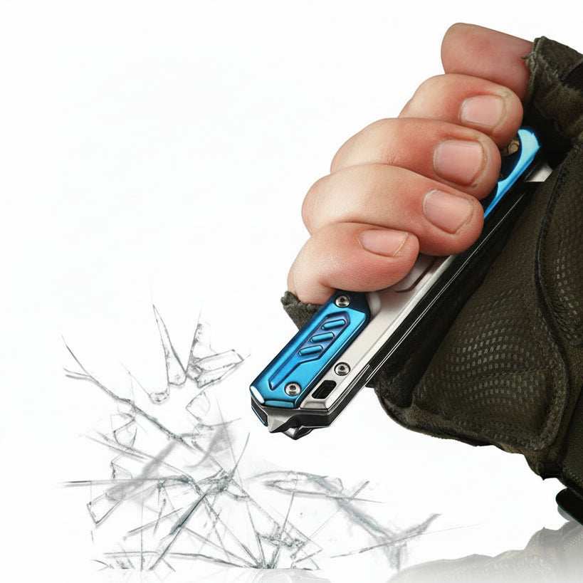 A close-up of a hand wearing a dark tactical glove holding a silver and blue metal tool, with cracked glass shown near the tip and Chinese text at the top reading '尾部破窗锥设计'.